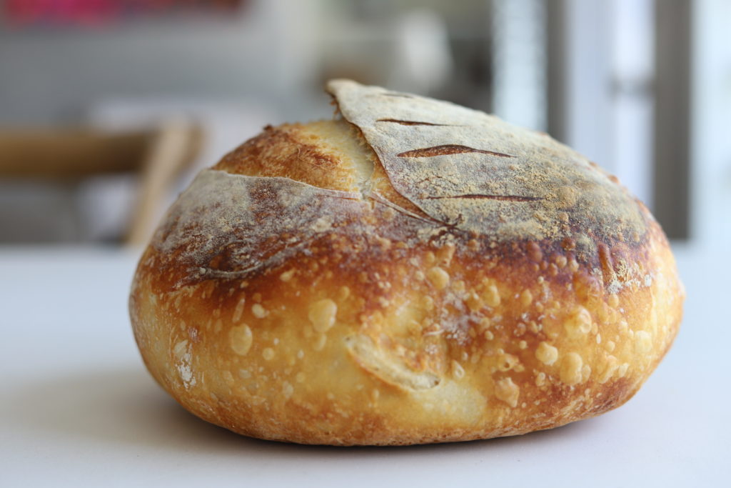 beautiful loaf of dutch oven sourdough bread